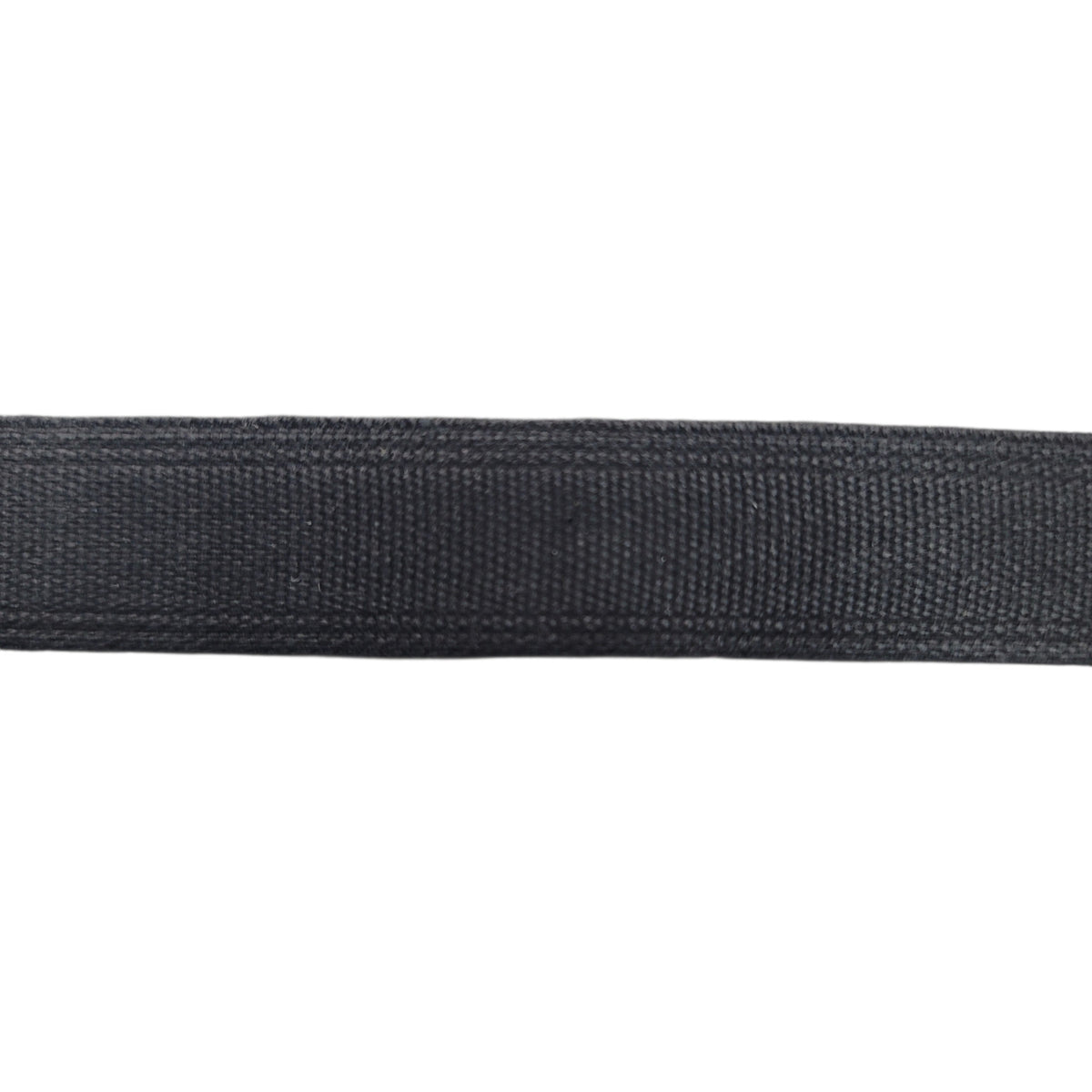 Close-up of black tunnel tape casing for corset boning against a white background.