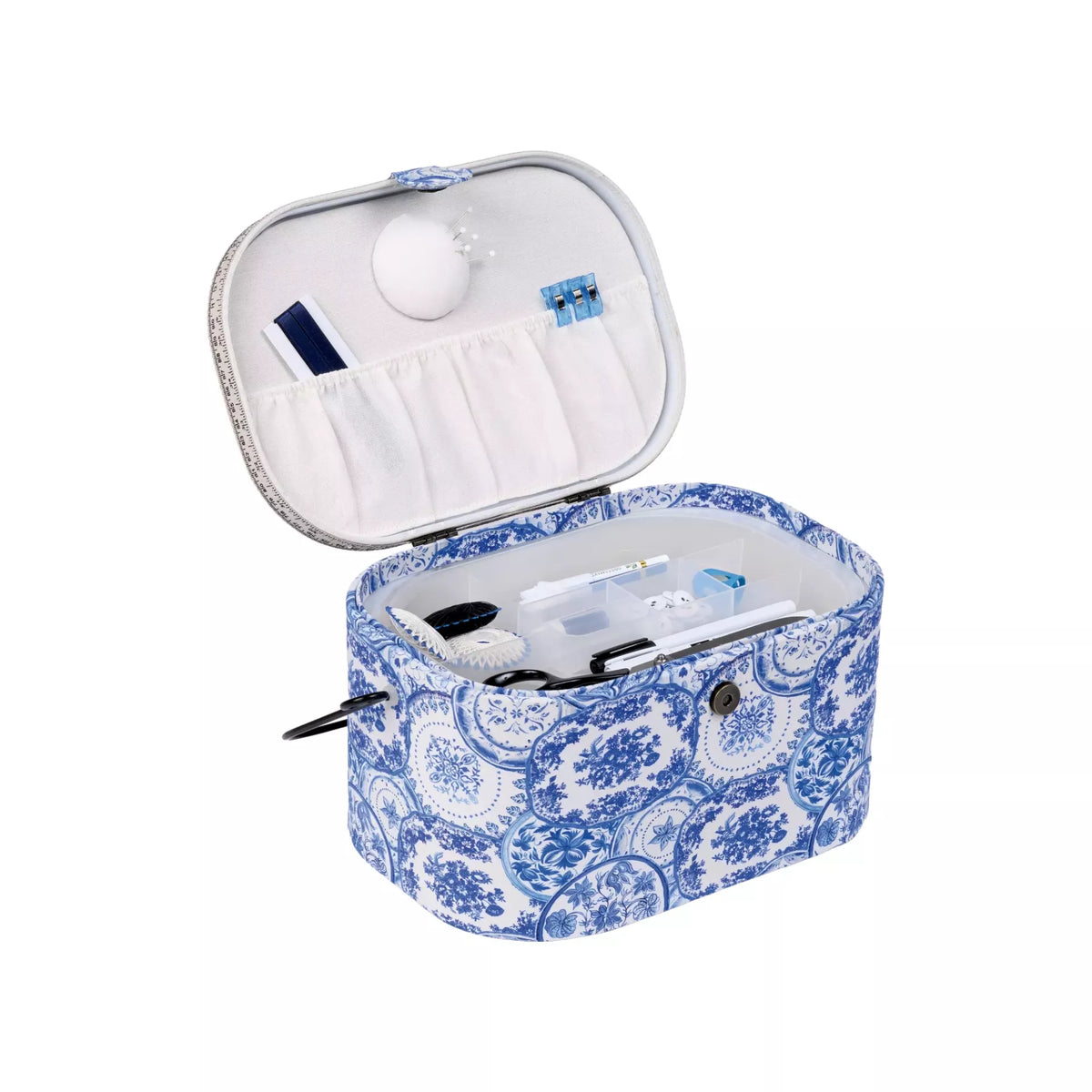 Large oval sewing basket in Delft Blue pattern with open lid showing storage compartments.