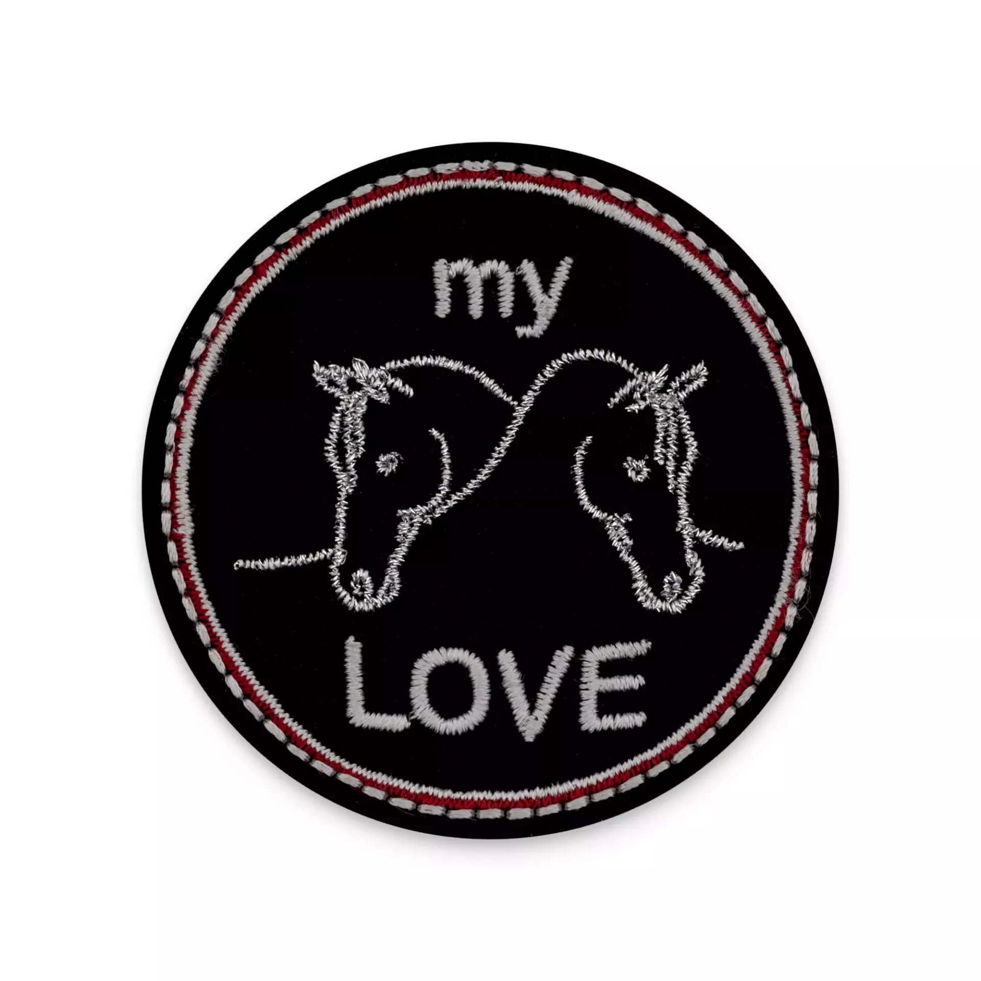 Circular black iron-on patch featuring two embroidered white horse heads and the text my LOVE.