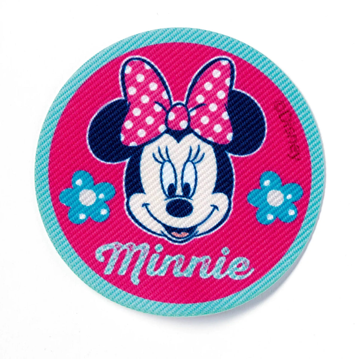 Round pink and blue iron-on appliqué featuring Minnie Mouse with two blue flowers.