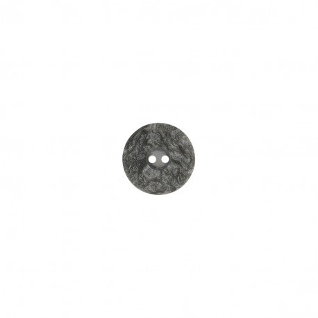 A round grey sewing button with a vintage lace texture and two center holes.