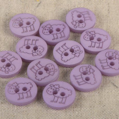 A collection of 15mm purple polyester sewing buttons featuring an engraved sheep design.