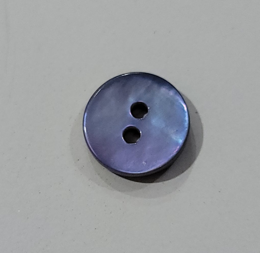 A 10mm round shell button with two holes.