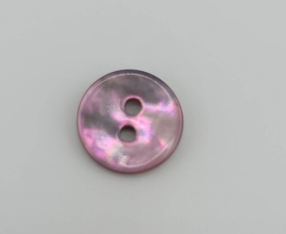 A single 10mm pink shell button with two holes.