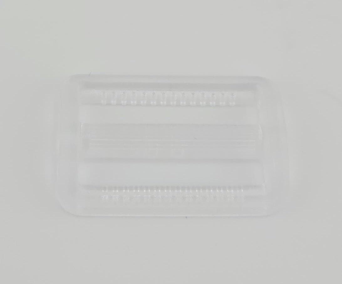Clear plastic 30mm belt adjuster with ribbed texture.