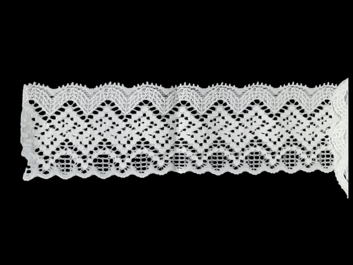 White embroidered tulle lace trim with a scalloped edge.