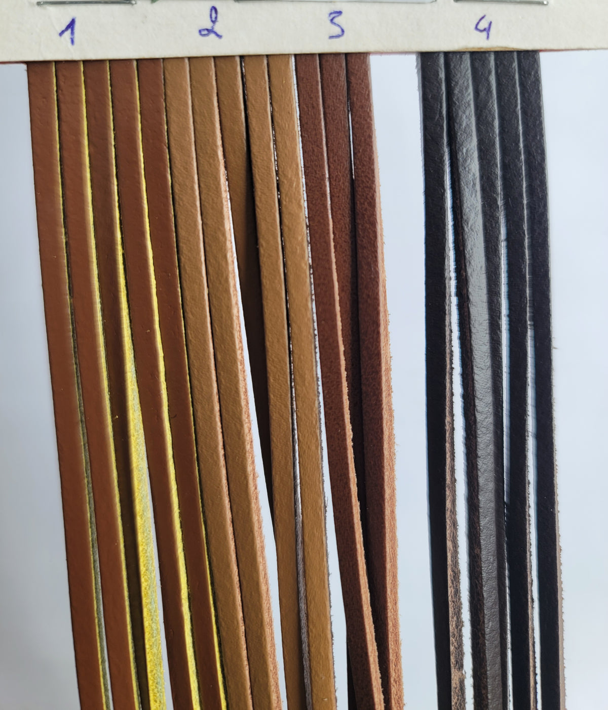 Leather tape in various brown and black shades, labeled 1 through 4.