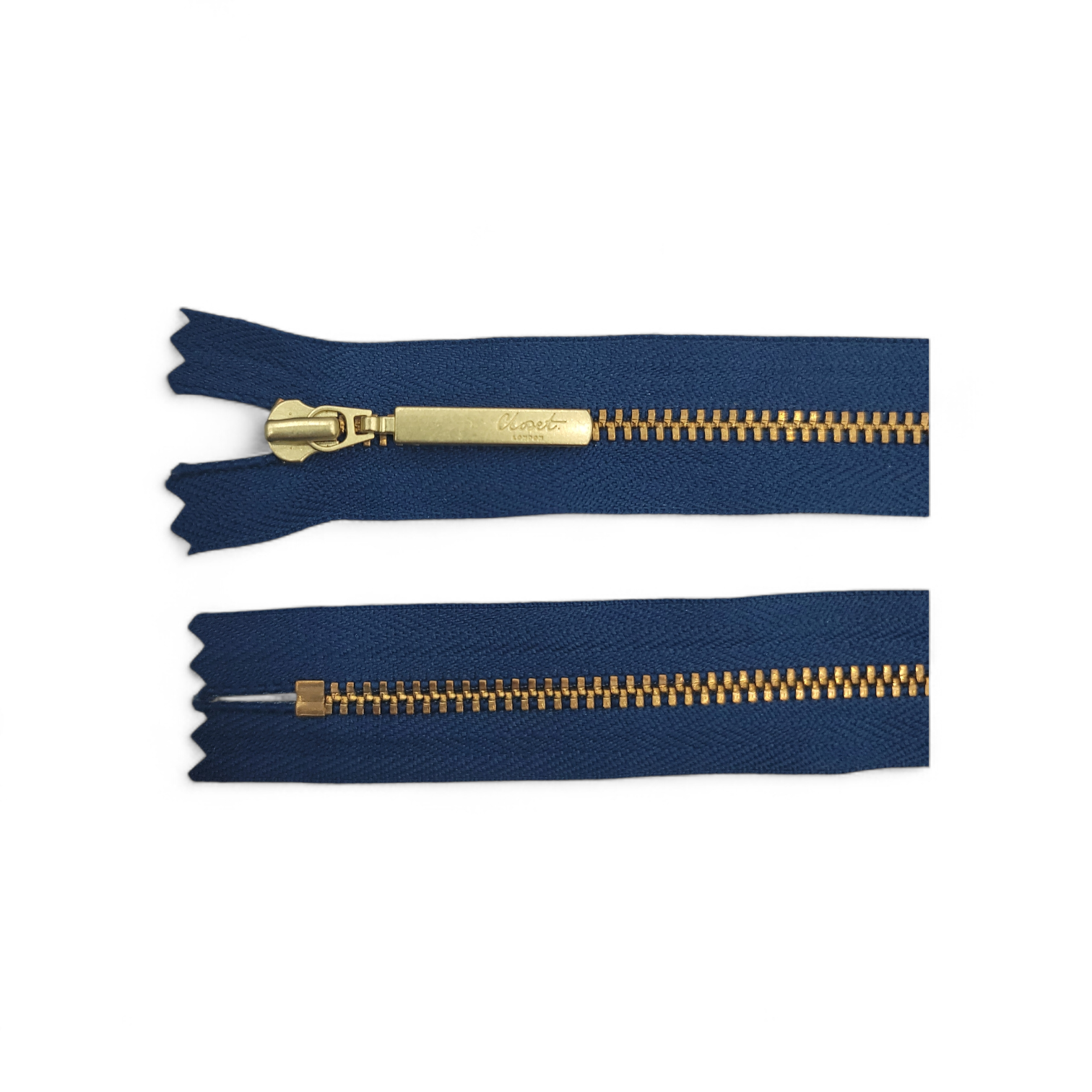 YKK size 3 closed end gold metal zip with navy tape.