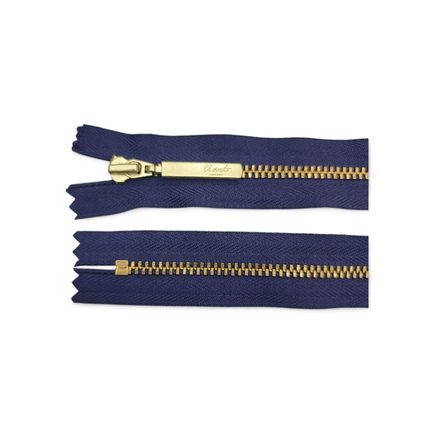 Two navy blue zippers with gold metal teeth and pull tabs, one partially open.