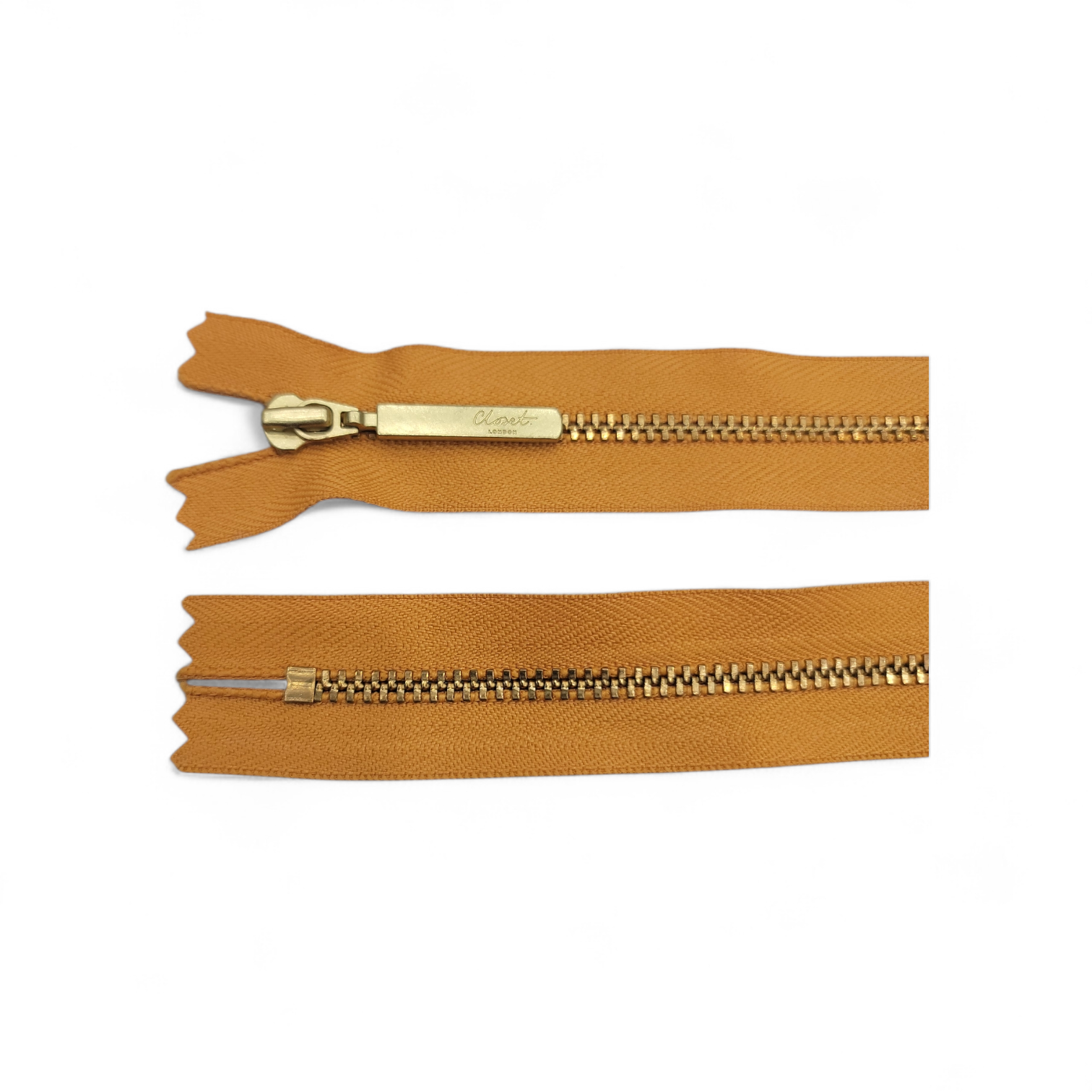 YKK size 3 closed end gold metal zip with brown tape.