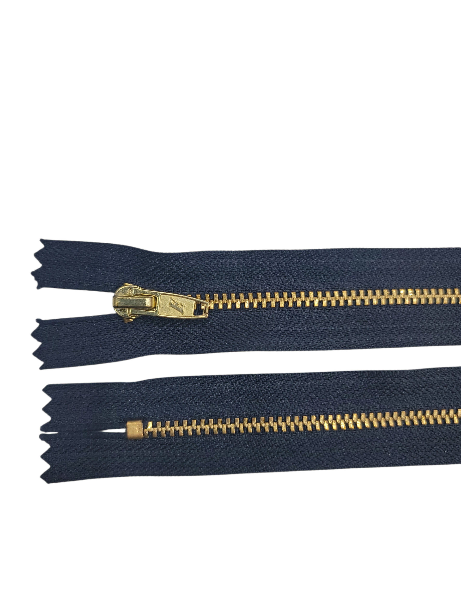 YKK size 3 closed end gold metal zipper with navy fabric.