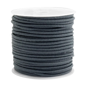 Beadalon dark grey elastic cord for jewelry making wound around a white plastic spool.