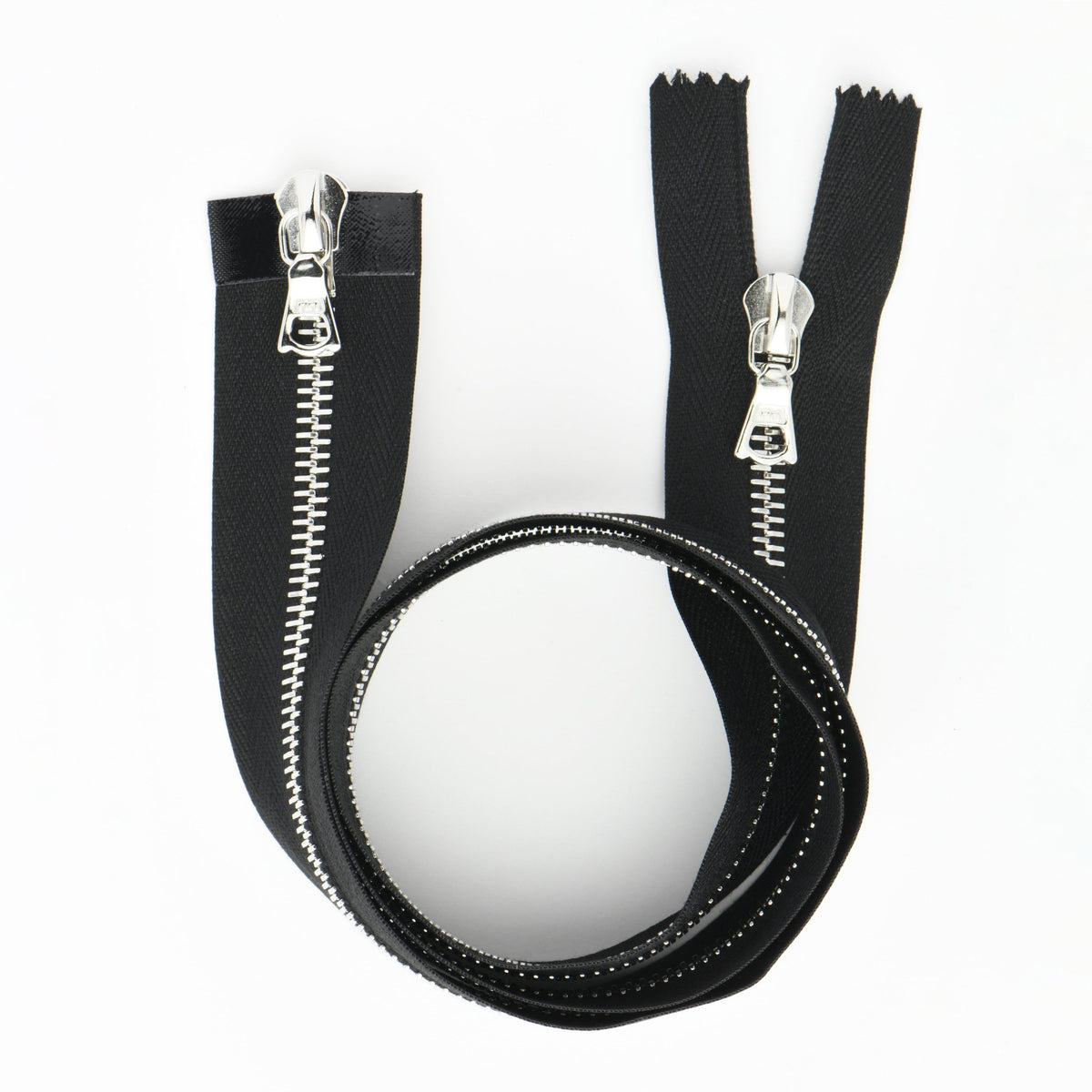 RIRI two-way open-end black metal zipper with silver pull tabs.
