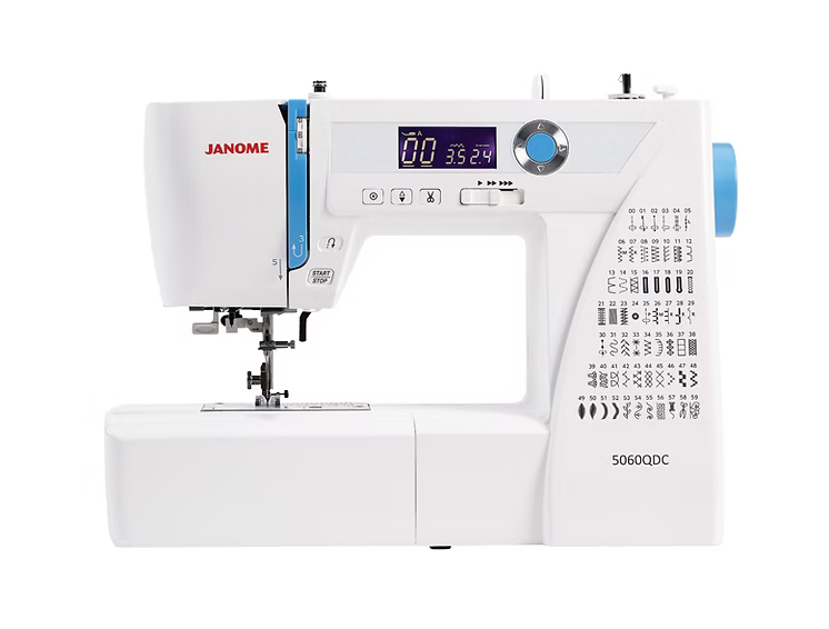 White Janome 5060 QDC computerized sewing machine with digital display and stitch guide.