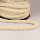 A coil of cream-colored polyester cord with a looped end.