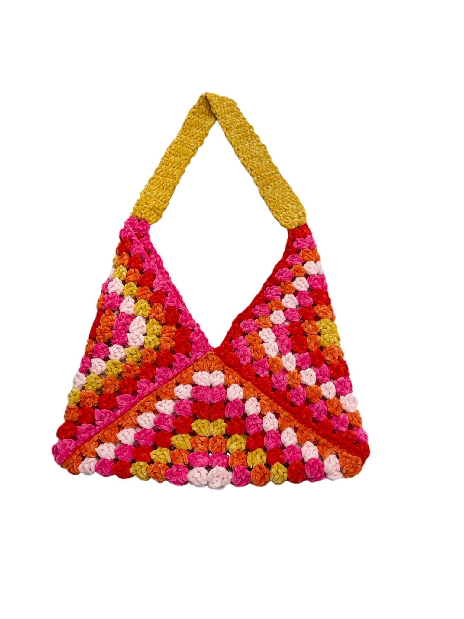 Crochet bag with mixed colors and a yellow handle.