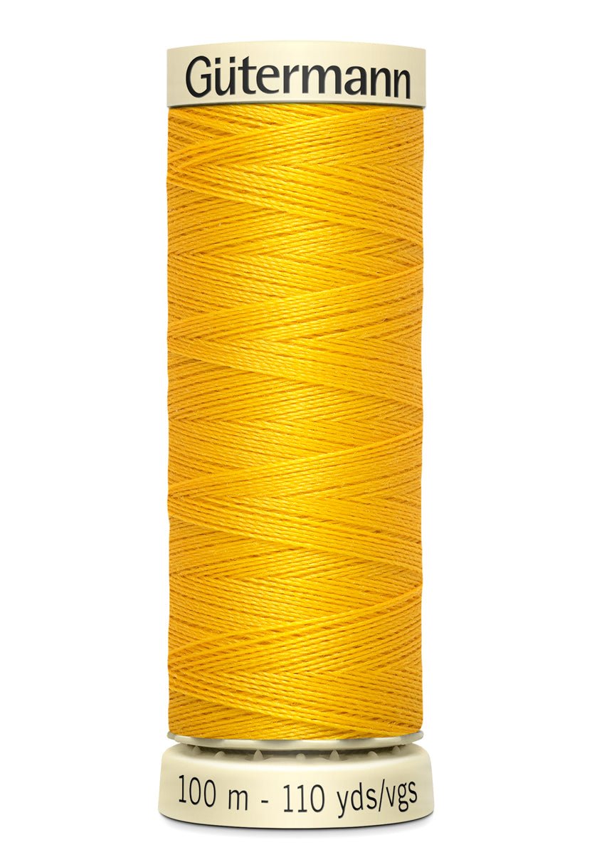 Gutermann Sew-All thread, 100m spool of yellow polyester thread.