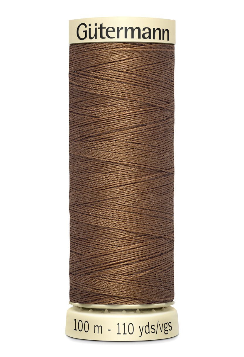 Gutermann Sew-All thread, 100m spool of brown 100% polyester sewing thread.