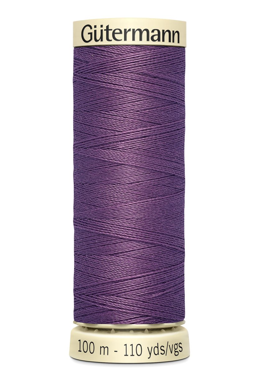 Gütermann Sew-All thread, 100m spool, purple polyester.