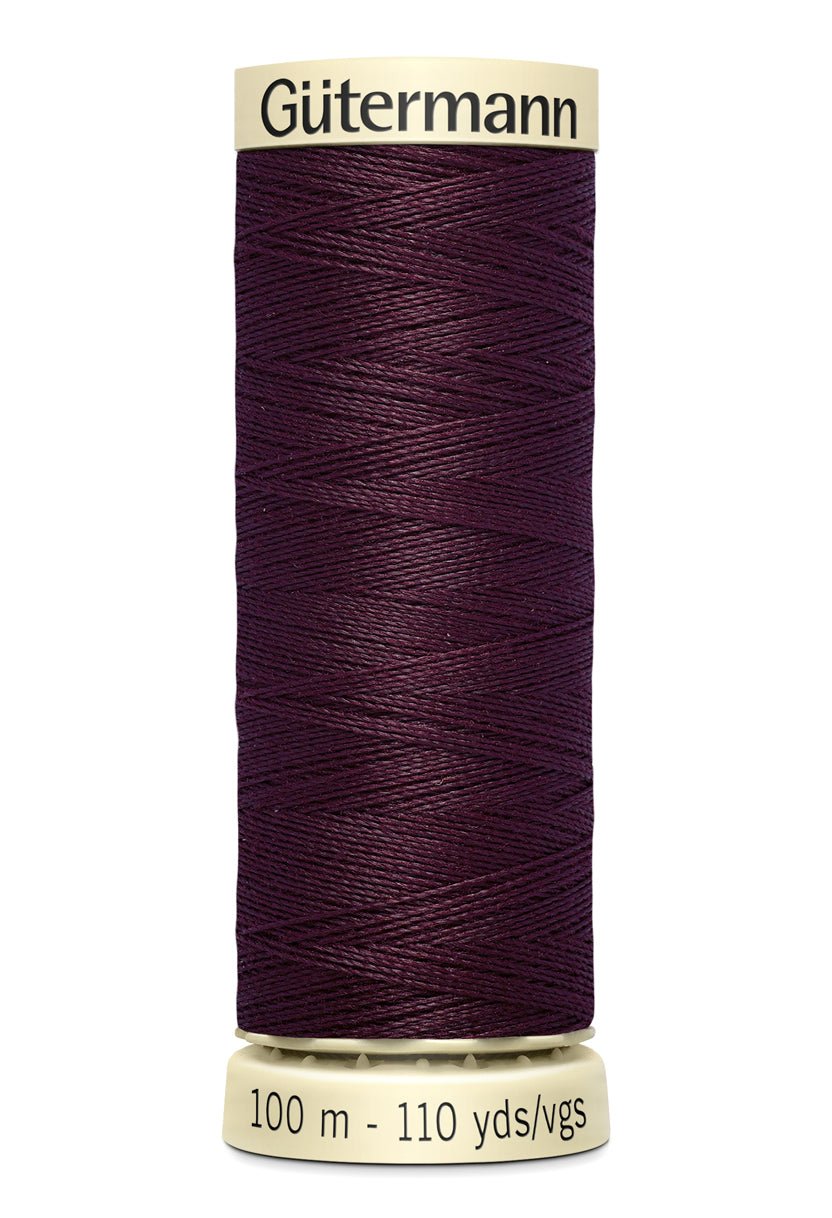 Gütermann Sew-All thread, 100m spool, dark purple polyester.