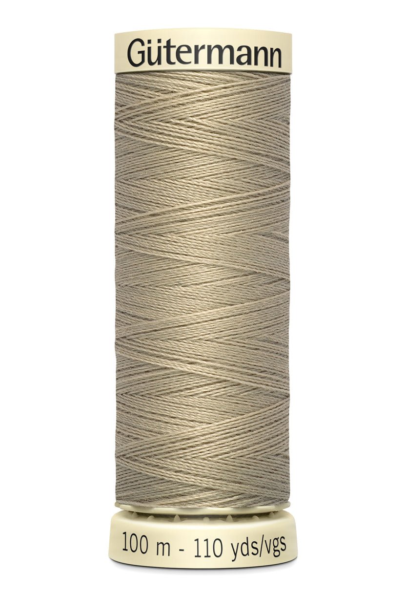 Gutermann Sew-All thread, 100m spool of beige polyester thread.