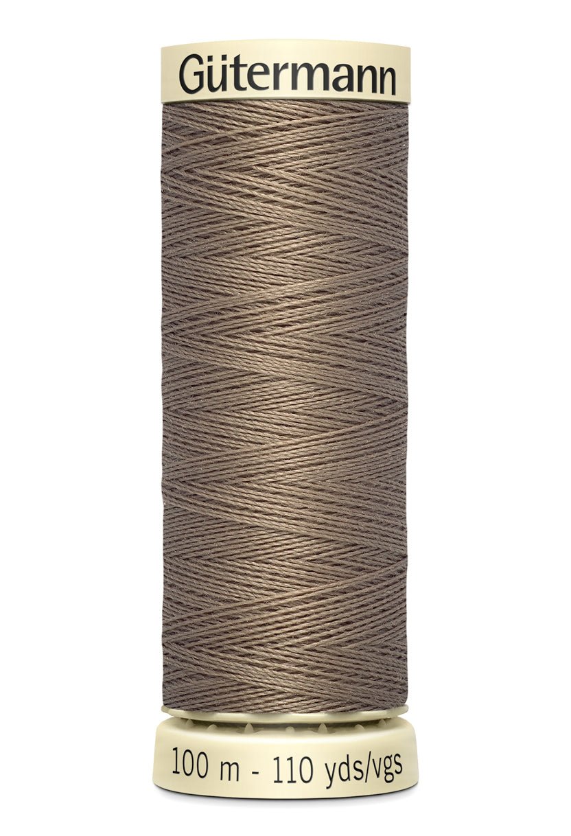 Gutermann Sew-All thread, 100% polyester, 100m, in a taupe color.