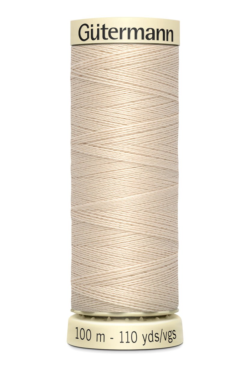 Gutermann Sew-All thread, 100m spool of beige 100% polyester sewing thread.