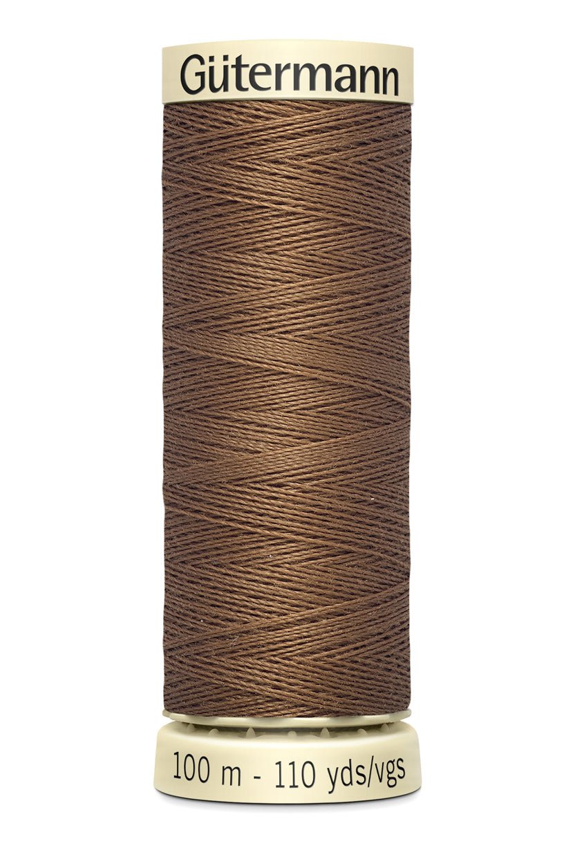 Gutermann Sew-All thread, 100m spool of brown 100% polyester sewing thread.