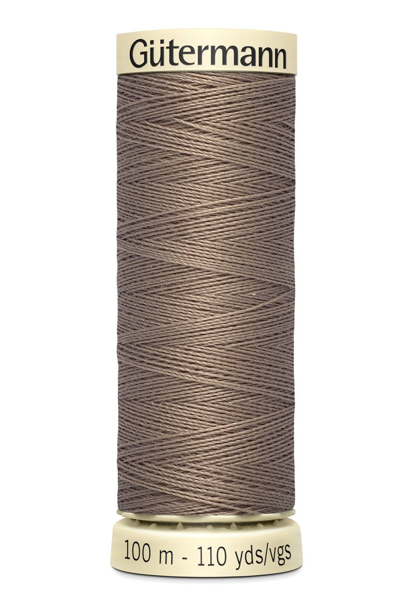 Gutermann Sew-All thread, 100m spool of brown polyester sewing thread.