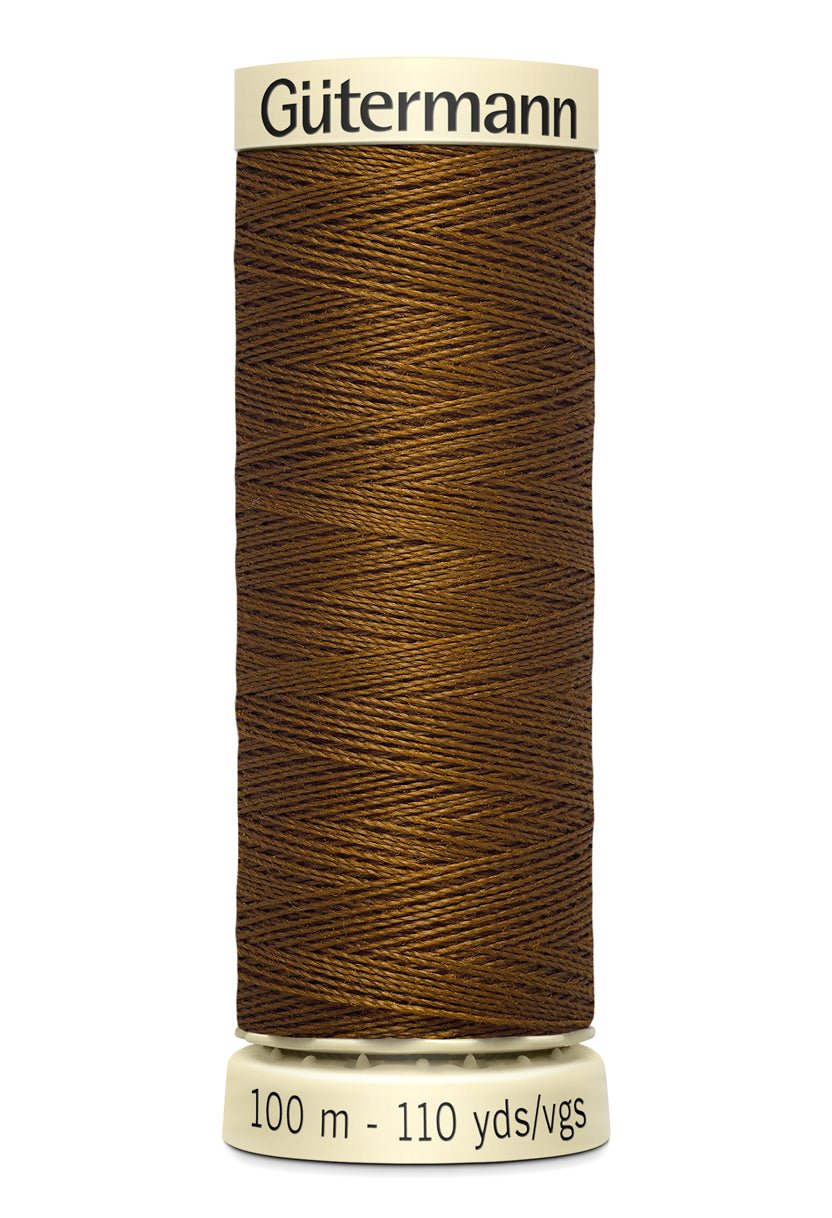 Gutermann Sew-All thread, 100m spool of brown 100% polyester thread.
