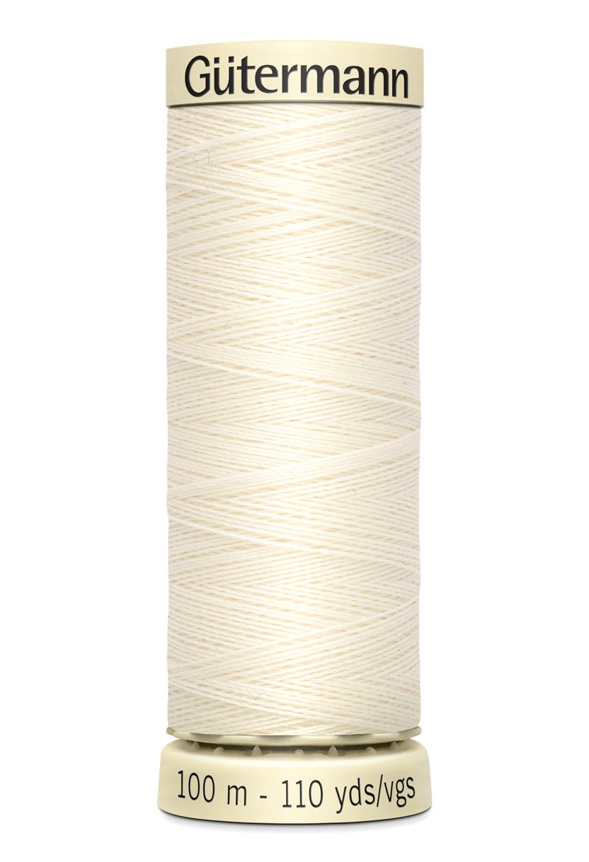Gutermann Sew-All thread, 100m spool of cream-colored 100% polyester sewing thread.