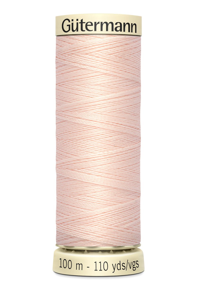 Gütermann Sew-All thread spool in light pink, 100m.