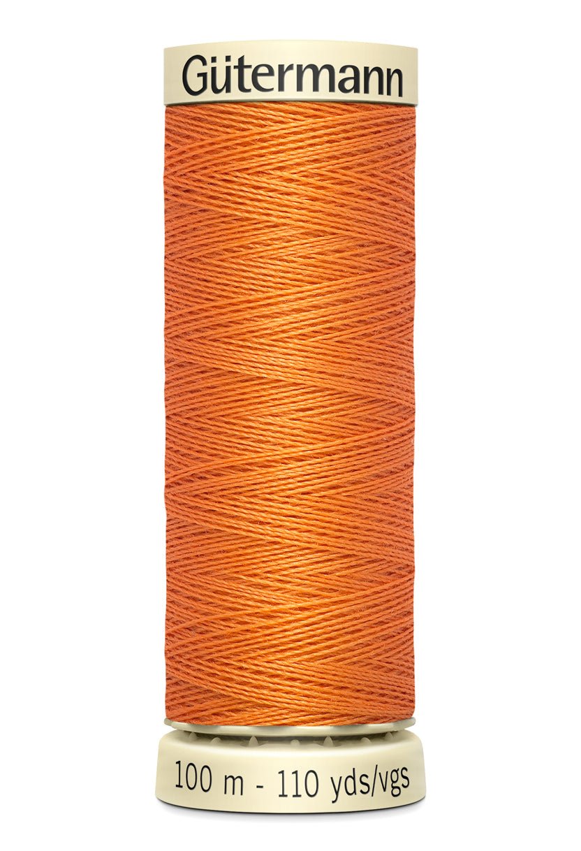 Gutermann Sew-All thread, 100m, orange polyester universal sewing thread.