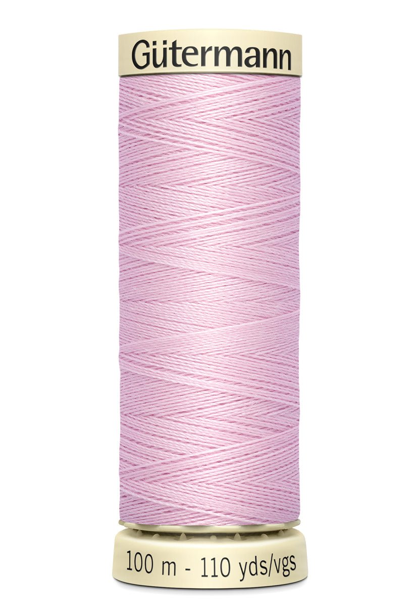 Gütermann Sew-All thread, 100m spool, light pink polyester.