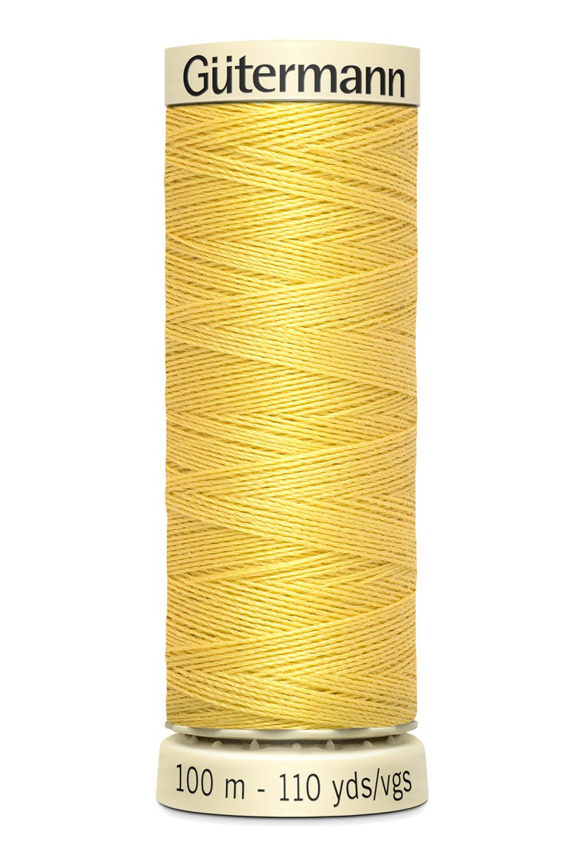 Gutermann Sew-All thread, 100m spool of yellow polyester thread.