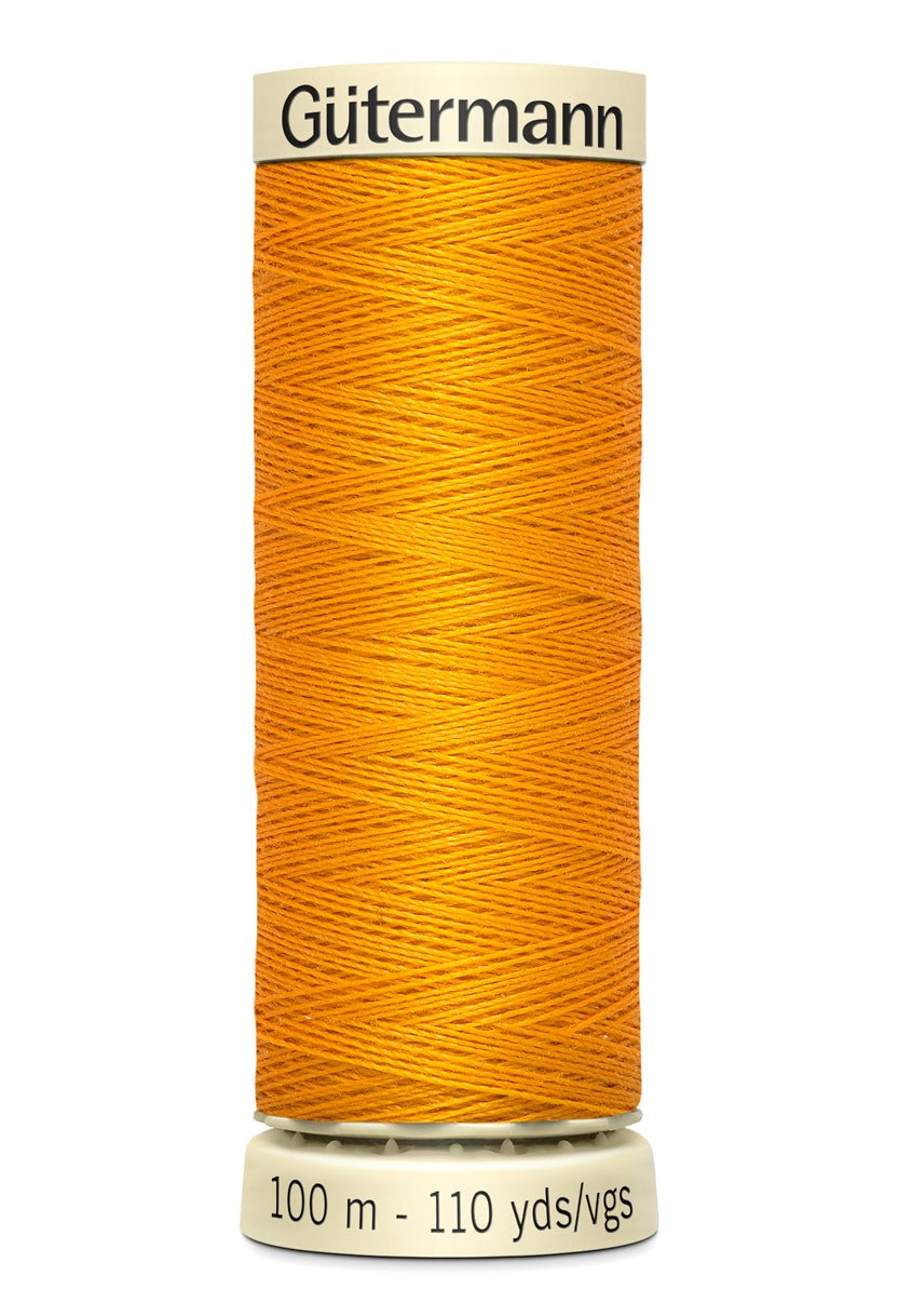 Gutermann Sew-All thread in orange, 100m spool.