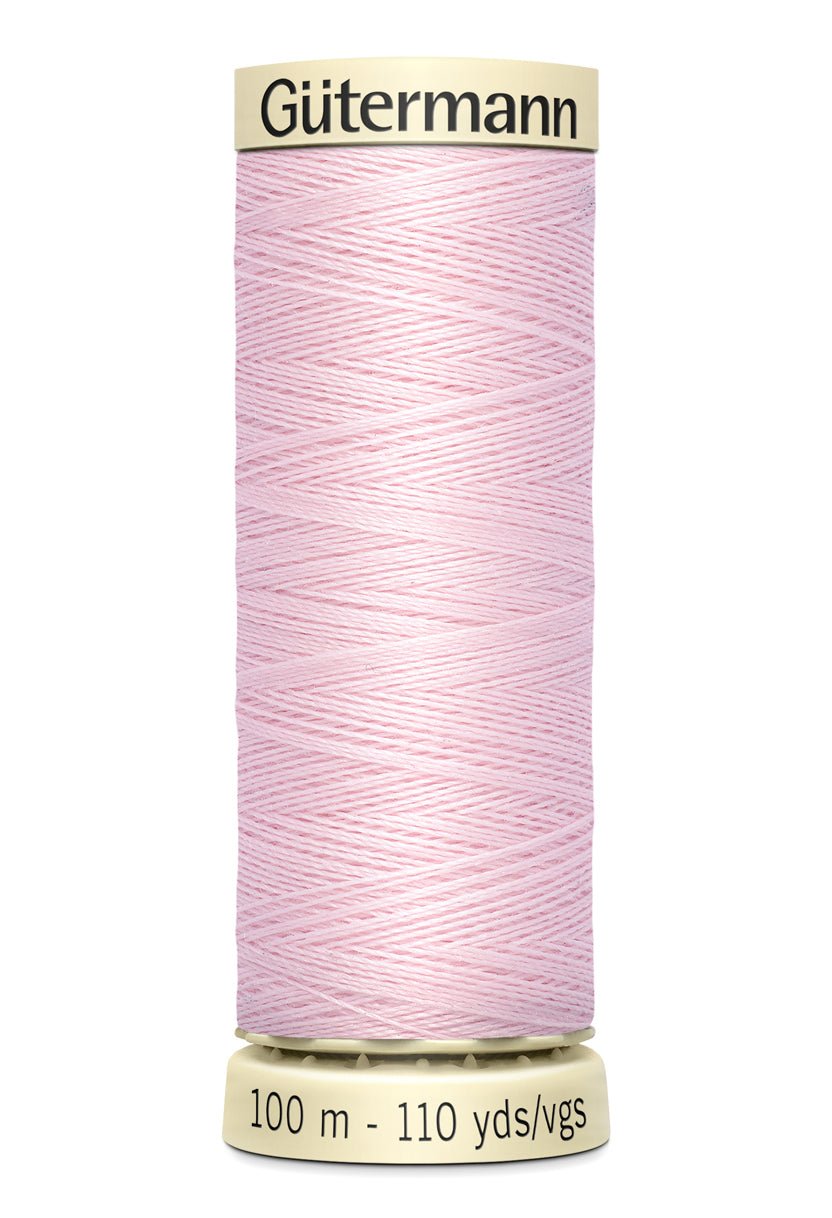 Gütermann Sew-All thread spool in light pink, 100m.