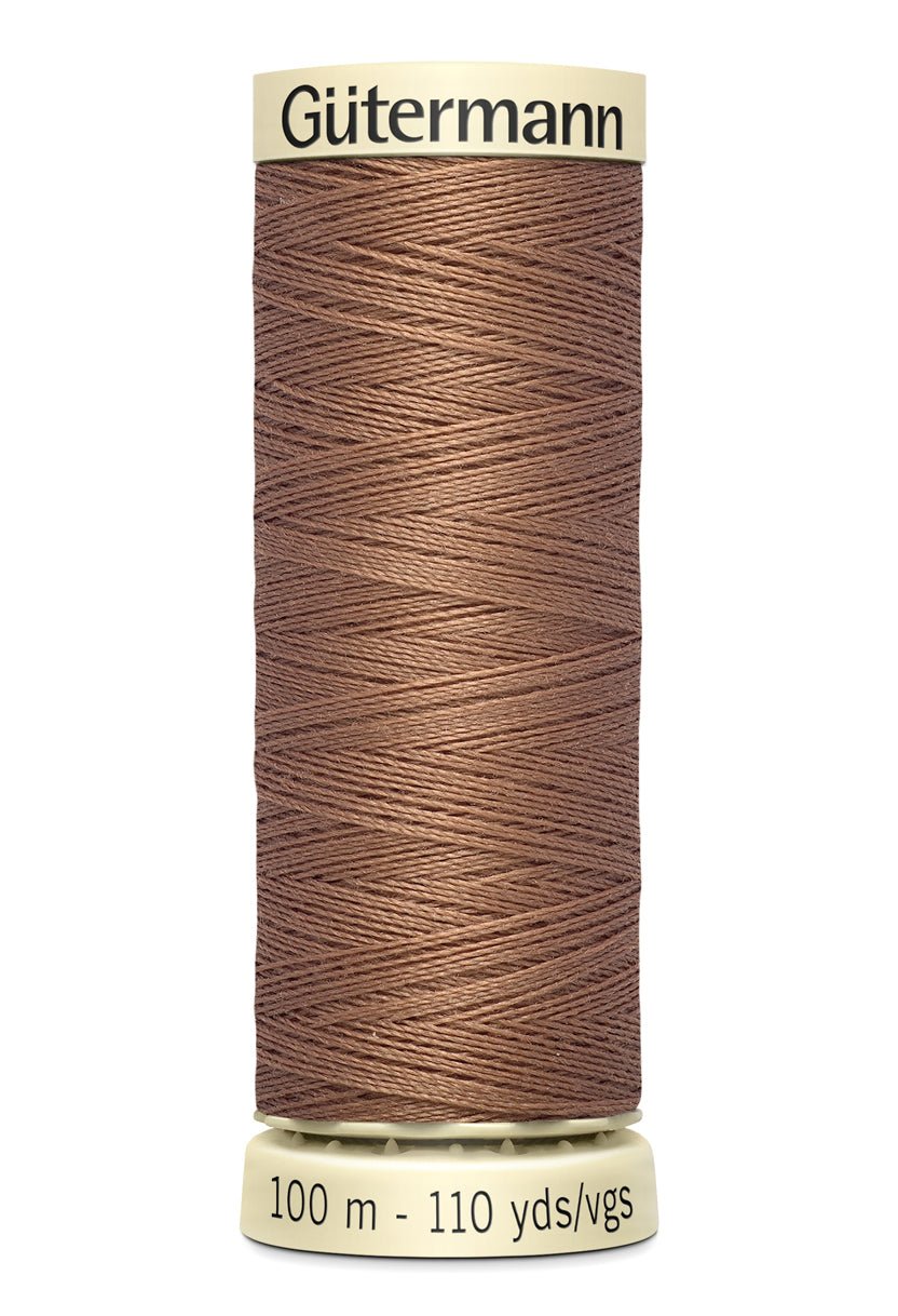 Gutermann Sew-All thread, 100m spool of brown 100% polyester thread.