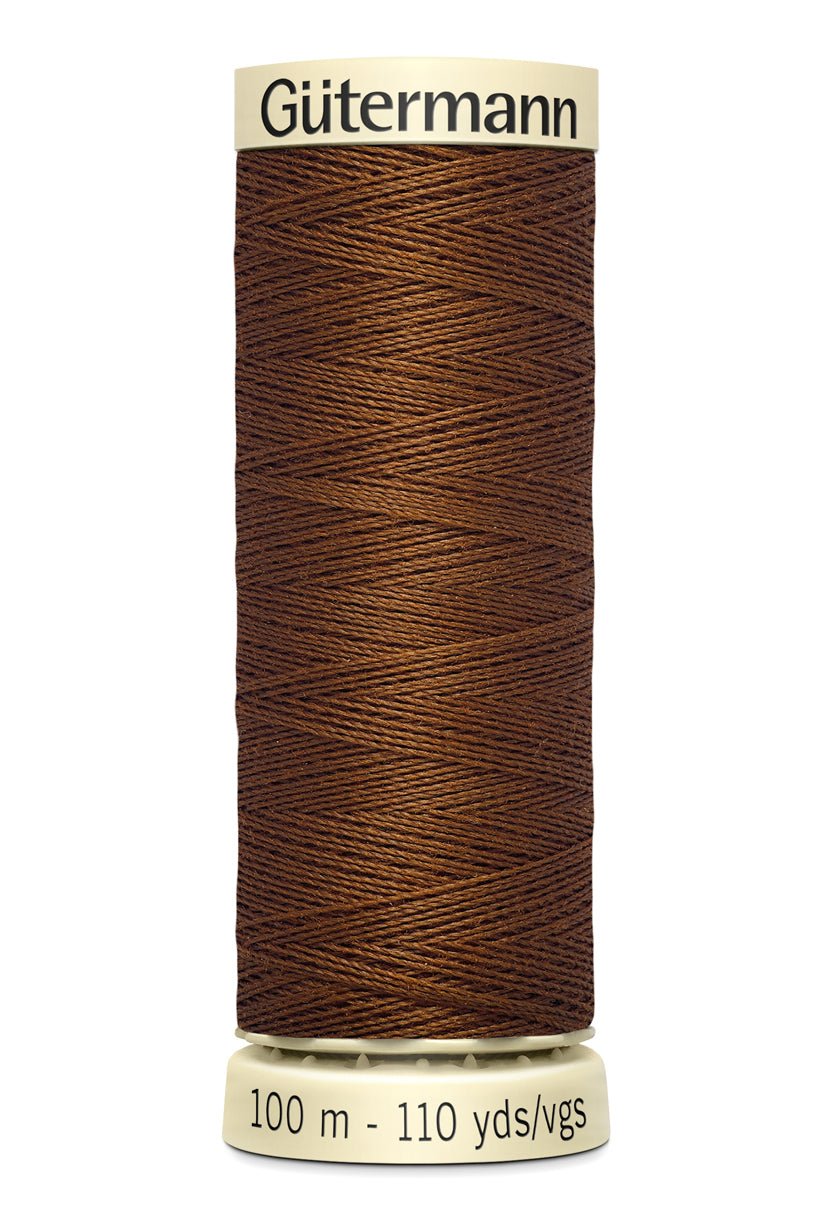 Gutermann Sew-All thread, 100m spool of brown 100% polyester sewing thread.