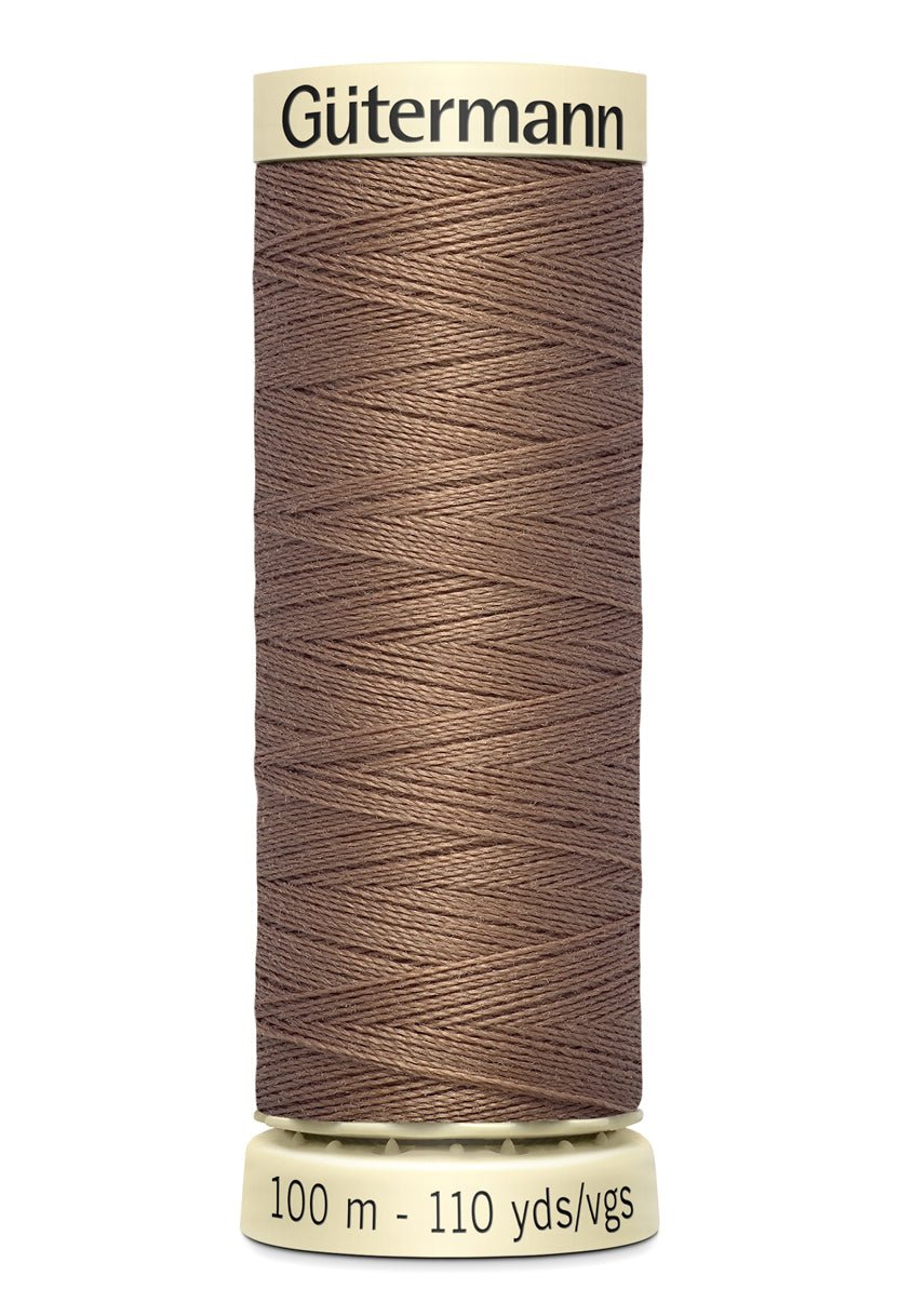 Gutermann Sew-All thread, 100m spool of brown 100% polyester thread.