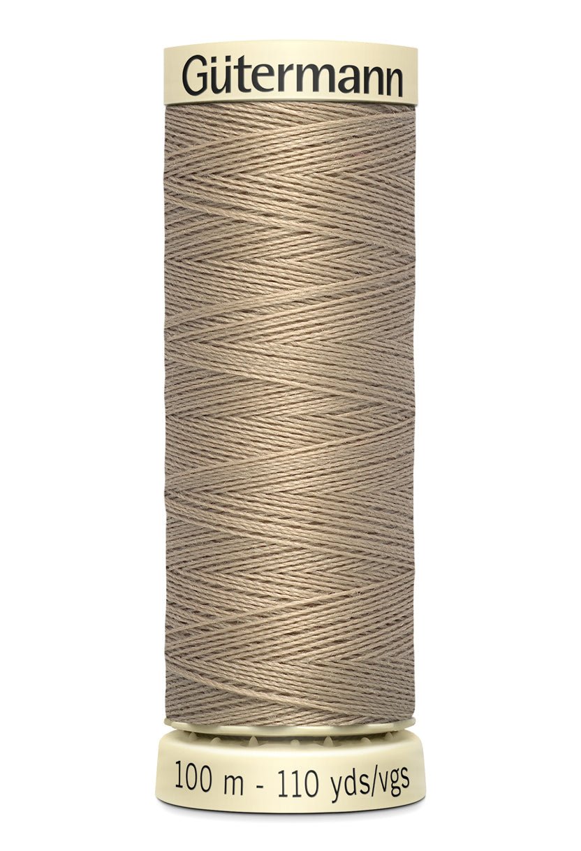 Gutermann Sew-All thread, 100m spool of beige 100% polyester sewing thread.