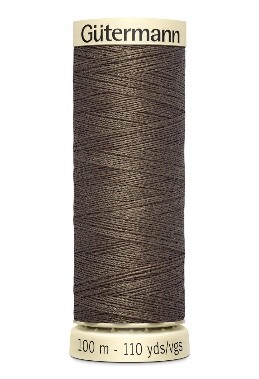 Gutermann Sew-All thread, 100m spool of brown polyester sewing thread.