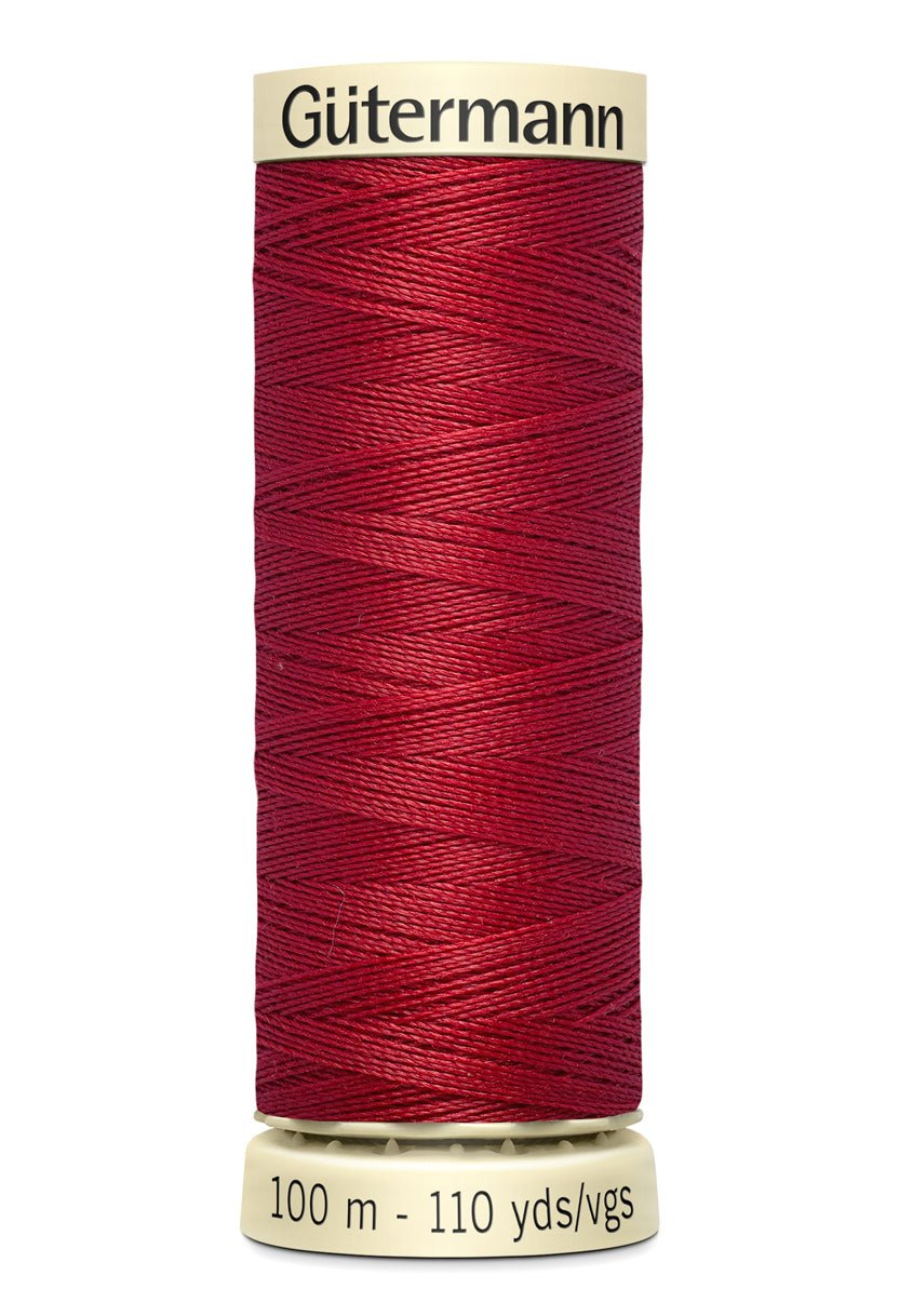 Gütermann Sew-All thread in red on a 100m spool.