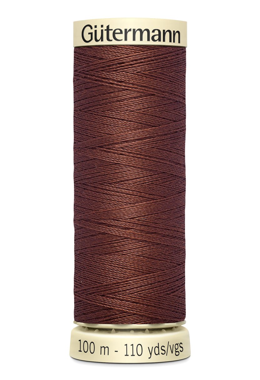 Gütermann Sew-All thread, 100m spool, brown polyester.