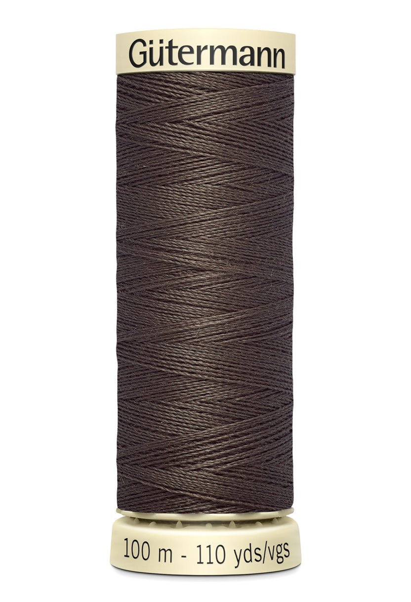 Gutermann Sew-All thread, 100m spool of dark brown 100% polyester thread.