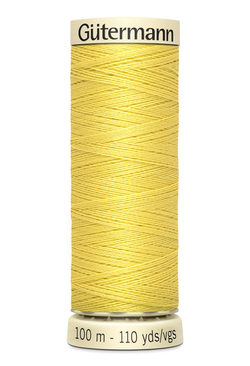 Gutermann Sew-All thread, 100m spool of yellow 100% polyester sewing thread.