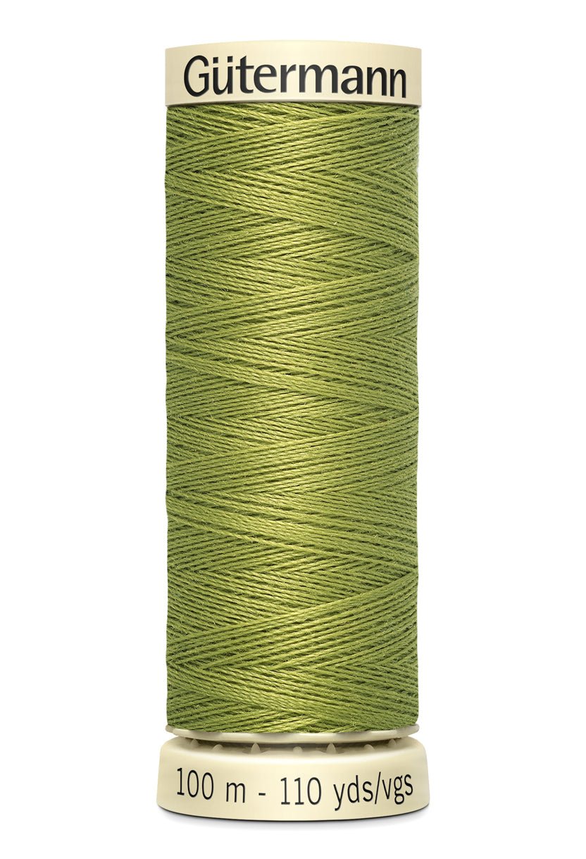 Gutermann Sew-All thread in a light green color on a spool.