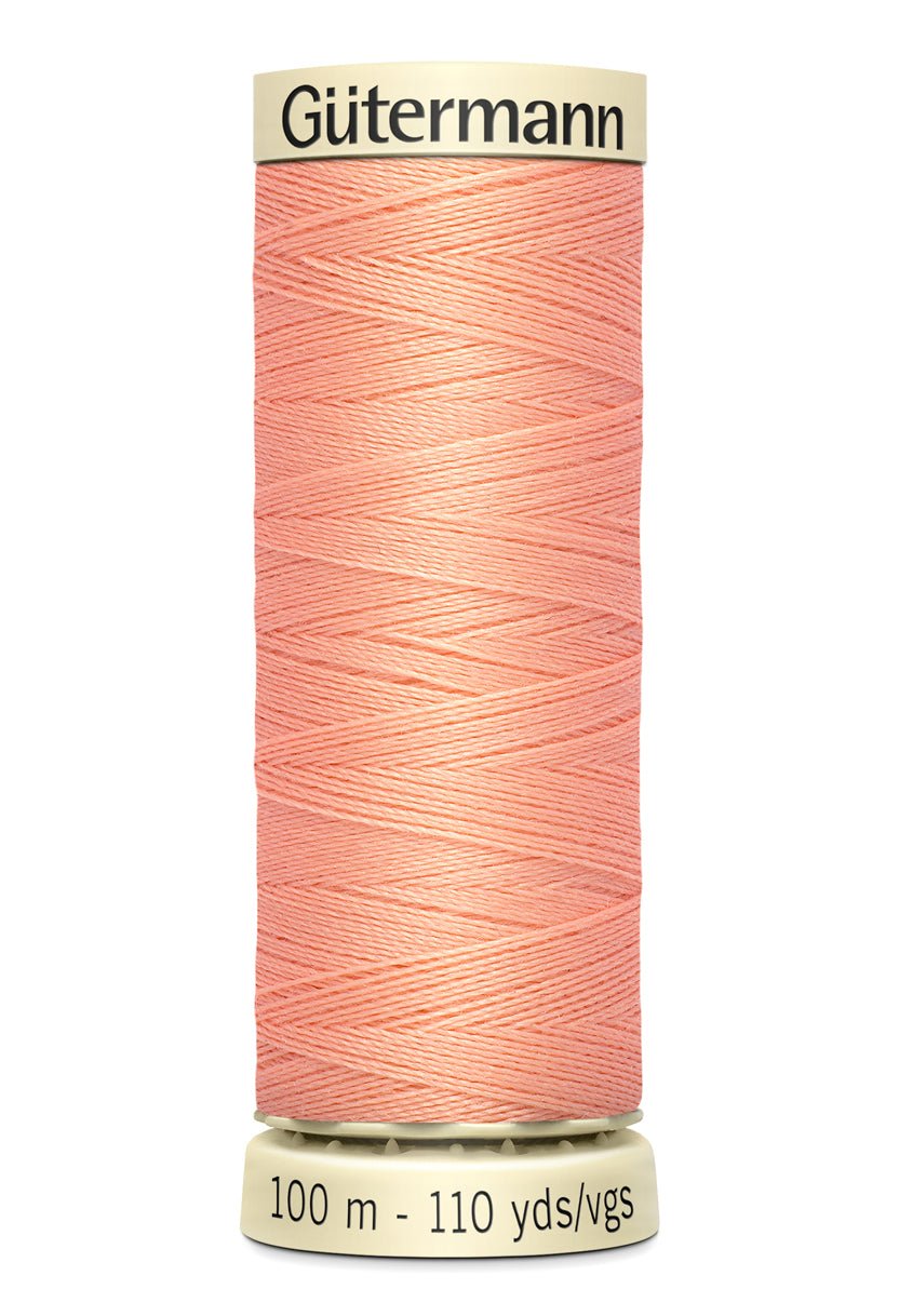 Gütermann Sew-All thread spool in peach, 100m.