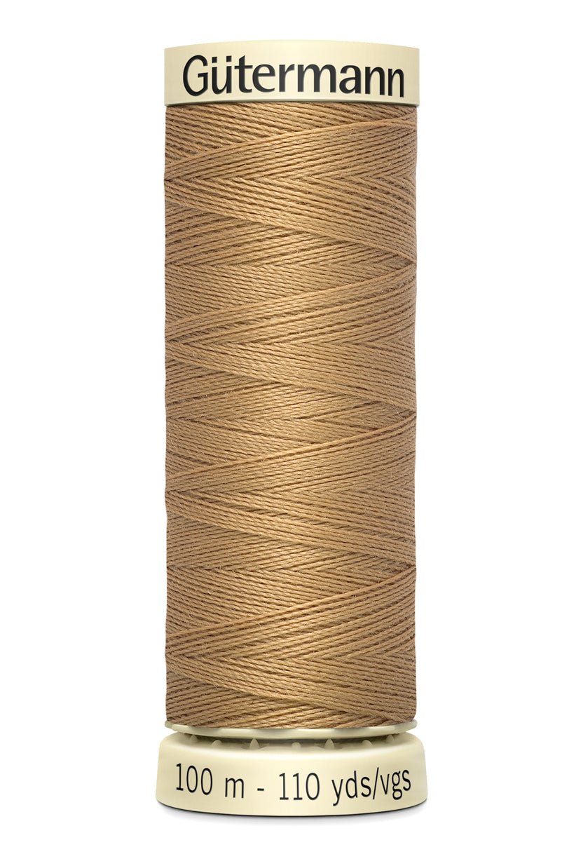 Gutermann Sew-All thread, 100m spool of 100% polyester thread in a light brown color.