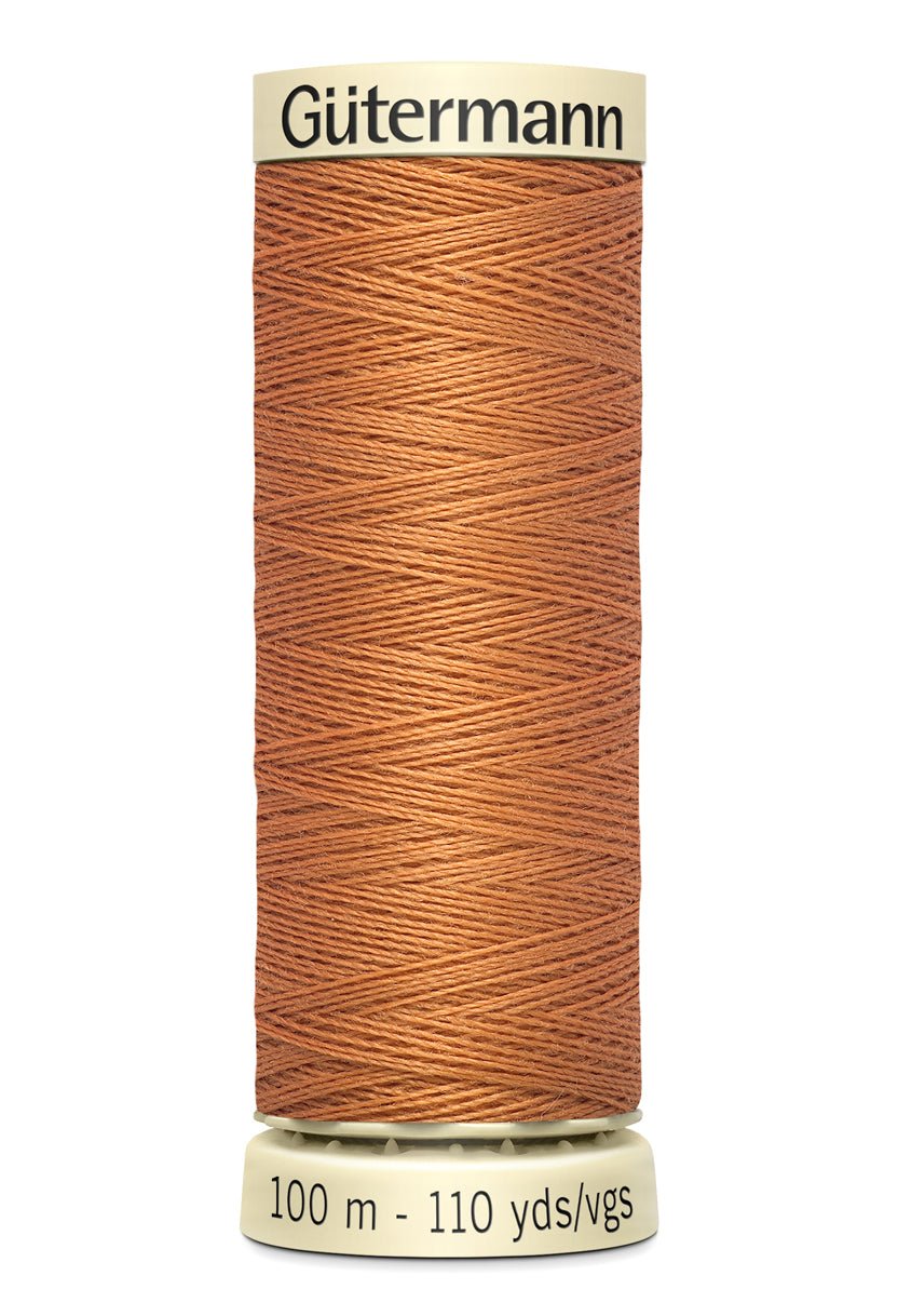 Gutermann Sew-All thread, 100m spool of 100% polyester in a warm brown color.